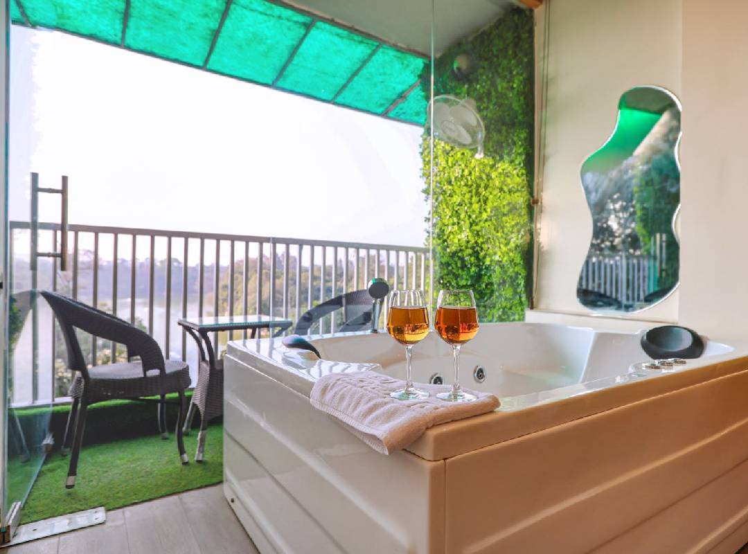 Private jacuzzi on the balcony at Casa Inali, an Airbnb for couples